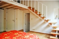 Separate mezzanine in the bedroom for an office or dressing area